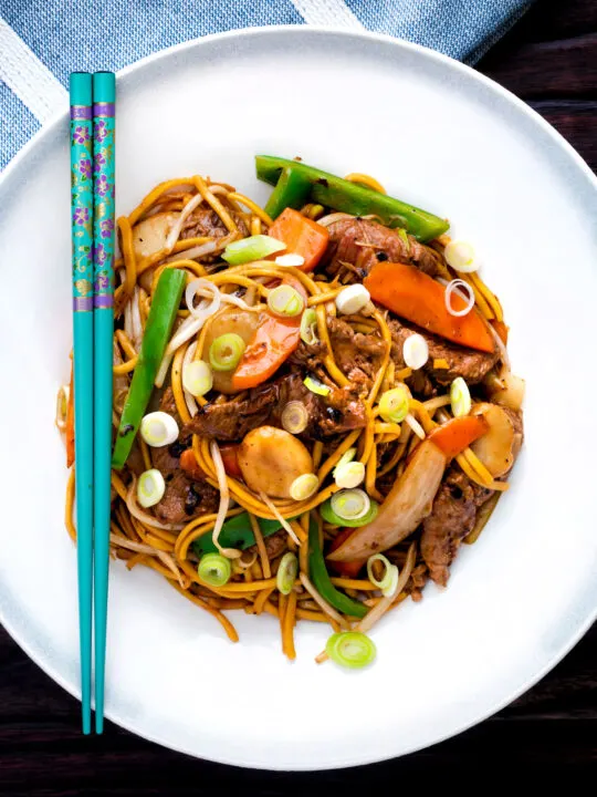 Overhead homemade Chinese beef chow mein fakeaway.