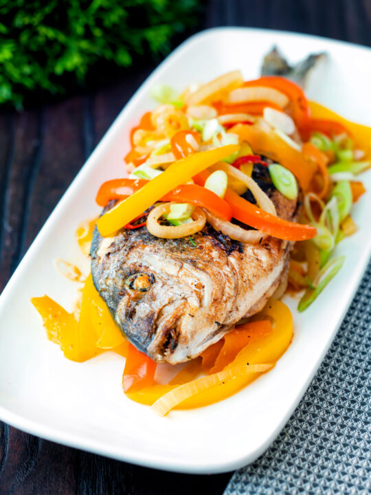 Jamaican influenced escovitch fish with sea bream and "pickled" peppers and onions.