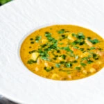 Chicken mulligatawny soup with coconut milk.