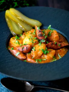 Hungarian paprikas krumpli or paprika potatoes stew with pickles.