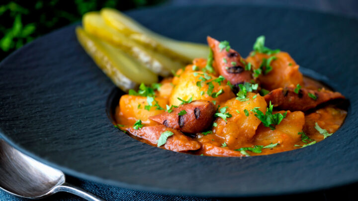 Hungarian paprikas krumpli or paprika potatoes stew with hotdog sausage or virsli.