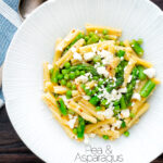 Overhead pea and asparagus pasta with casarecce, feta cheese and chilli flakes featuring a title overlay.