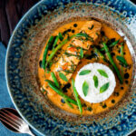 Red Thai salmon curry with green beans, Thai basil and jasmine rice.