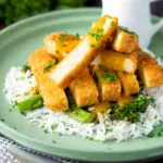 Tofu katsu curry with a homemade sauce, rice and soy roasted tenderstem broccoli.