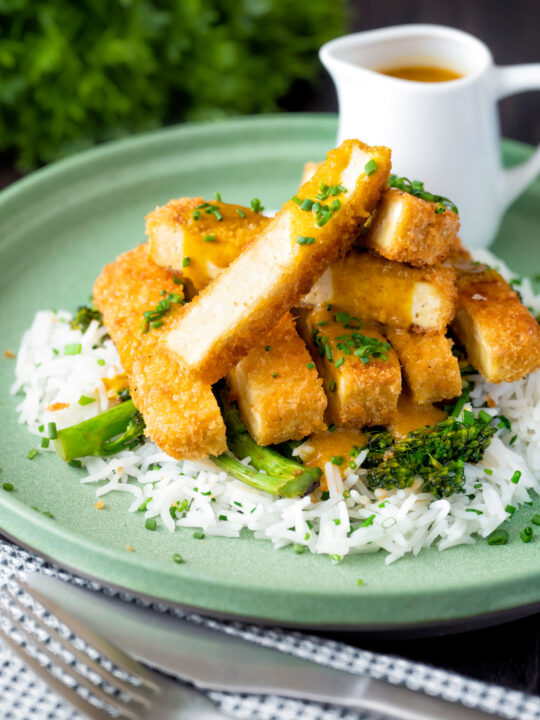 Tofu katsu curry with a homemade sauce, rice and soy roasted tenderstem broccoli.