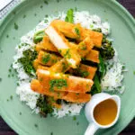 Overhead tofu katsu curry with a homemade sauce, rice and soy roasted tenderstem broccoli.