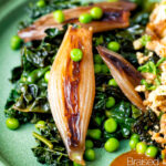 Braised cavolo nero with peas and shallots featuring a title overlay.