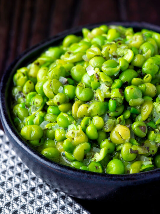 Close up quick and easy crushed or smashed minted peas.