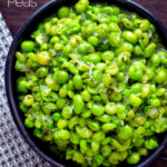 Overhead quick and easy crushed or smashed minted peas featuring a title overlay.