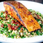 Pan fried harissa salmon fillet served with tabbouleh salad.