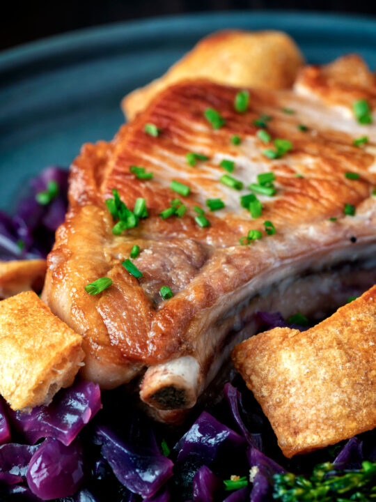 Instant Pot pork chops with red cabbage with crispy crackling.