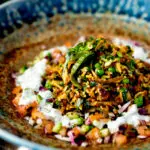 Keema rice served with kachumber salad and mint raita.