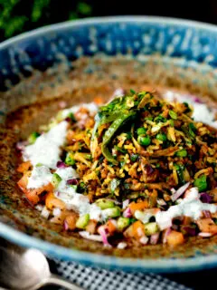 Keema rice served with kachumber salad and mint raita.