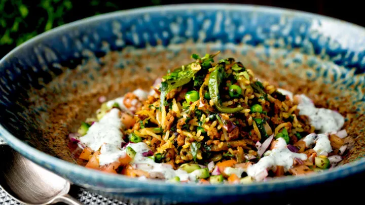 Keema rice or keema chawal served with kachumber salad and mint raita.