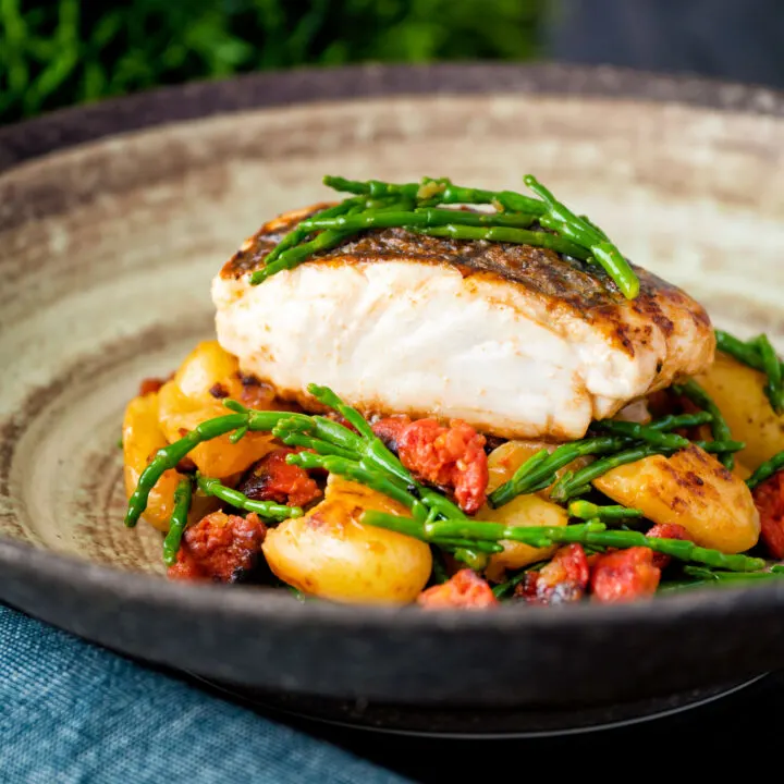 Crispy skinned pan fried hake with chorizo, new potatoes and samphire.