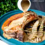 Creamy cider tarragon sauce poured over pork chops with griddled pears featuring a title overlay.