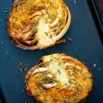 Overhead roasted savoy cabbage with fennel seeds.