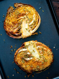 Overhead roasted savoy cabbage with fennel seeds.