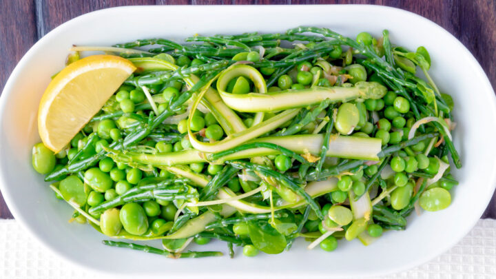 Warm samphire salad with peas, broad beans, shaved asparagus and lemon.