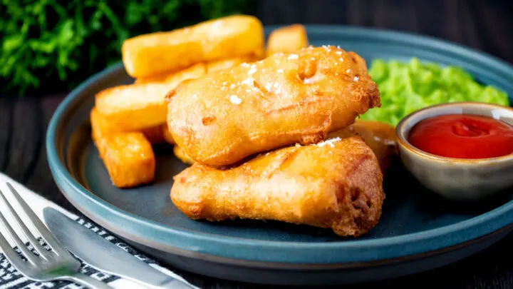 Crispy fried spam fritters in beer batter served with chips, mushy peas and ketchup.