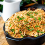 Root vegetable crumble with an oaty crumb in a vegan gravy.
