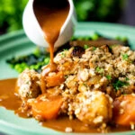 Vegan onion gravy poured over a root vegetable crumble featuring a title overlay.