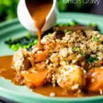 Vegan onion gravy poured over a root vegetable crumble.