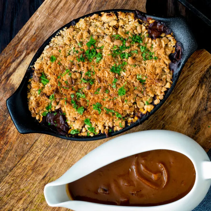 Root vegetable crumble served with a vegan onion gravy.