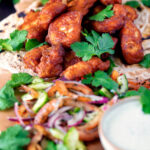 Amritsari fish pakora served with chapatis, chunky kachumber salad and raita.