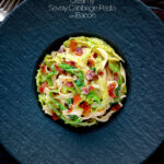 Overhead creamy savoy cabbage pasta with crispy bacon and sour cream featuring a title overlay.