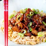 Chinese takeaway style crispy orange chicken with egg fried rice.