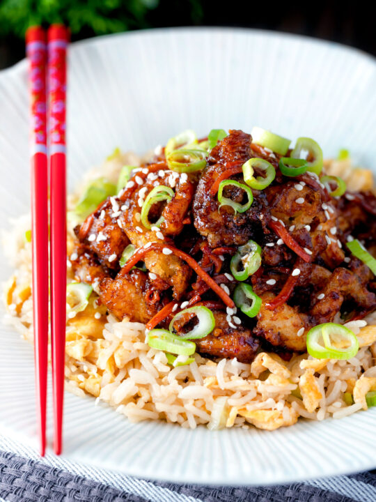 Chinese takeaway style crispy orange chicken with egg fried rice.