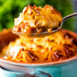 Spoonfull of a traditional British mince beef cottage pie.