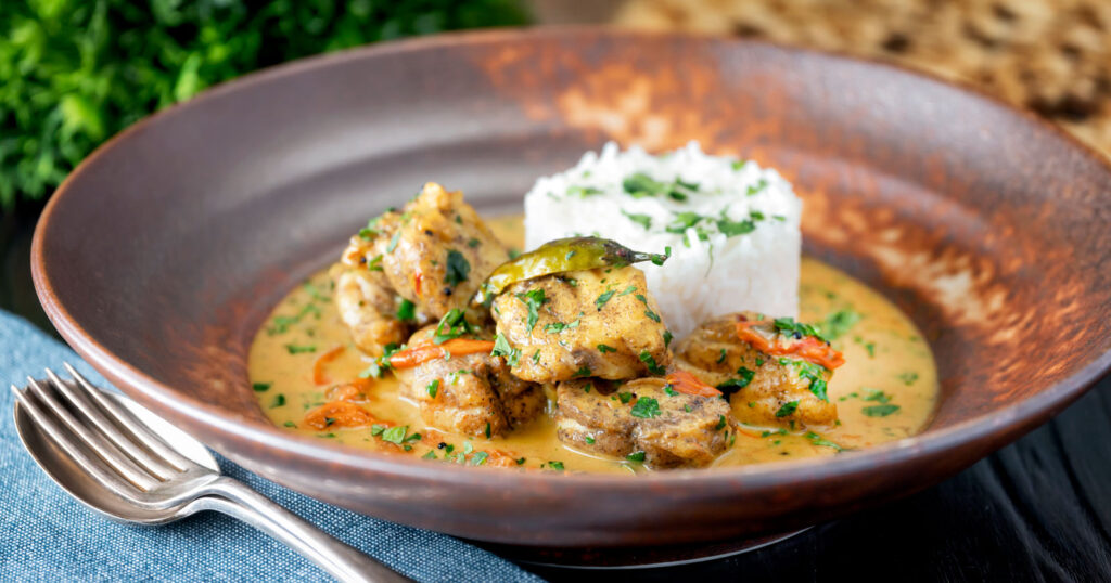 South Indian influenced monkfish curry with coconut milk gravy and steamed rice.