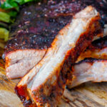 Close up oven baked sticky BBQ pork ribs.