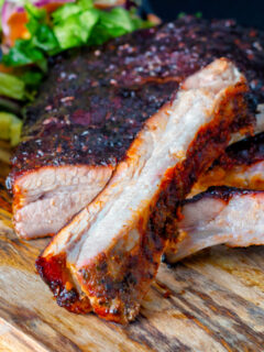 Close up oven baked sticky BBQ pork ribs.