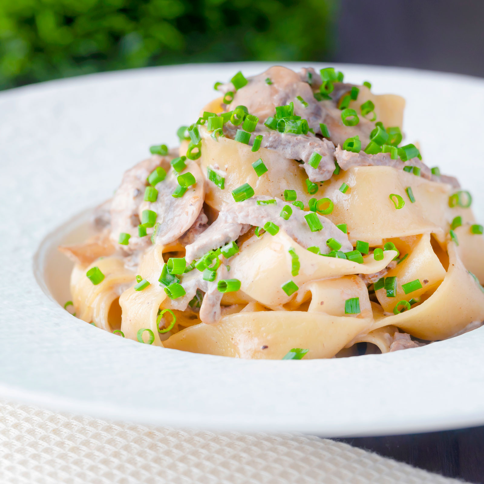 Creamy steak pappardelle pasta with a Diane sauce and snipped chives.