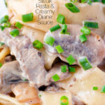 Close up creamy steak pappardelle pasta with a Diane sauce featuring a title overlay.