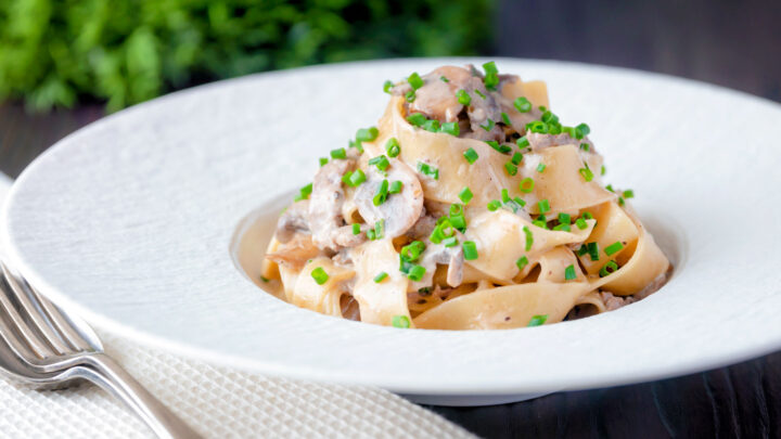 Creamy steak pappardelle pasta with a Diane sauce and snipped chives.