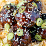 Close up easy teriyaki glazed beef meatballs with egg fried rice featuring a title overlay.