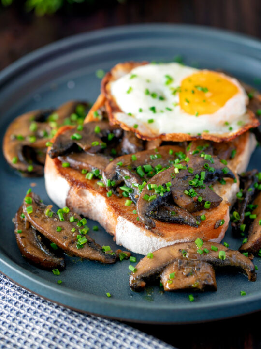 Easy devilled mushrooms on toast with a fried egg.