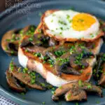 Easy devilled mushrooms on toast with a fried egg featuring a title overlay.