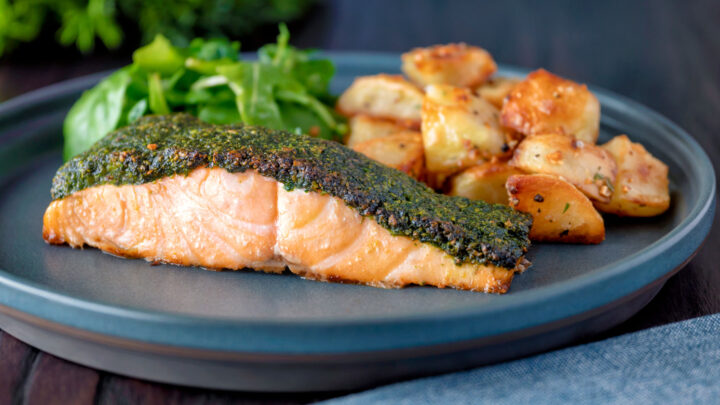 Baked pistachio and herb crusted salmon fillet with parmentier potatoes and green salad.