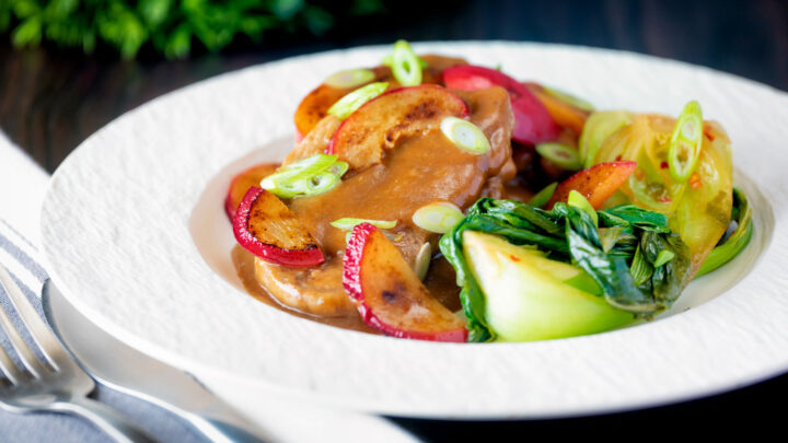 Pork tenderloin with a fresh plum sauce and steamed pak choi.