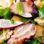 Close up sausage salad with apple, new potatoes, bacon and rocket or arugula featuring a title overlay.