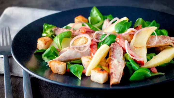 Smoked mackerel salad with apple, bacon, shallots and croutons.