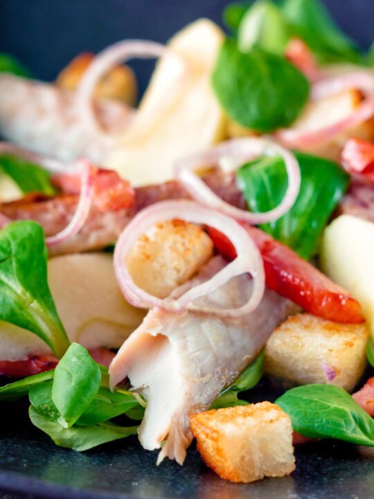 Smoked mackerel salad with apple, bacon and croutons.