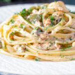 Canned salmon pasta with linguini, cornichons and dill.
