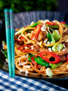 Chicken satay stir fry with peanuts and egg noodles.