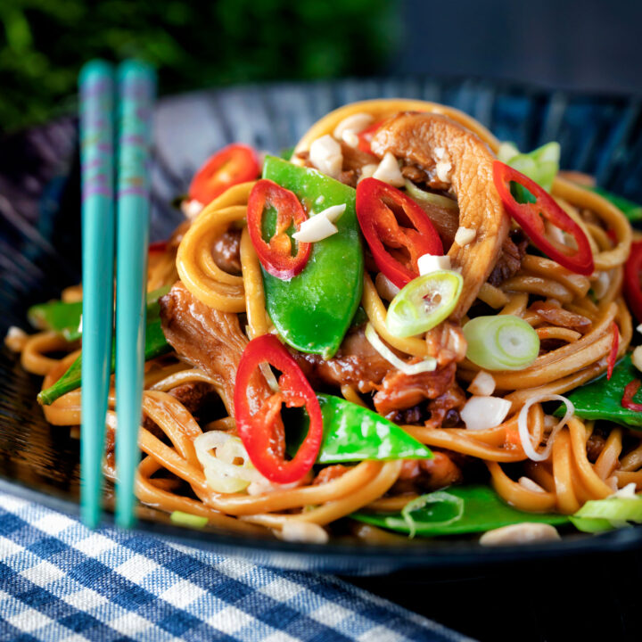 Chicken satay stir fry with peanuts, mangetout and egg noodles.